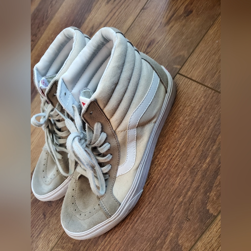 Tan Vans hightop canvas shoes